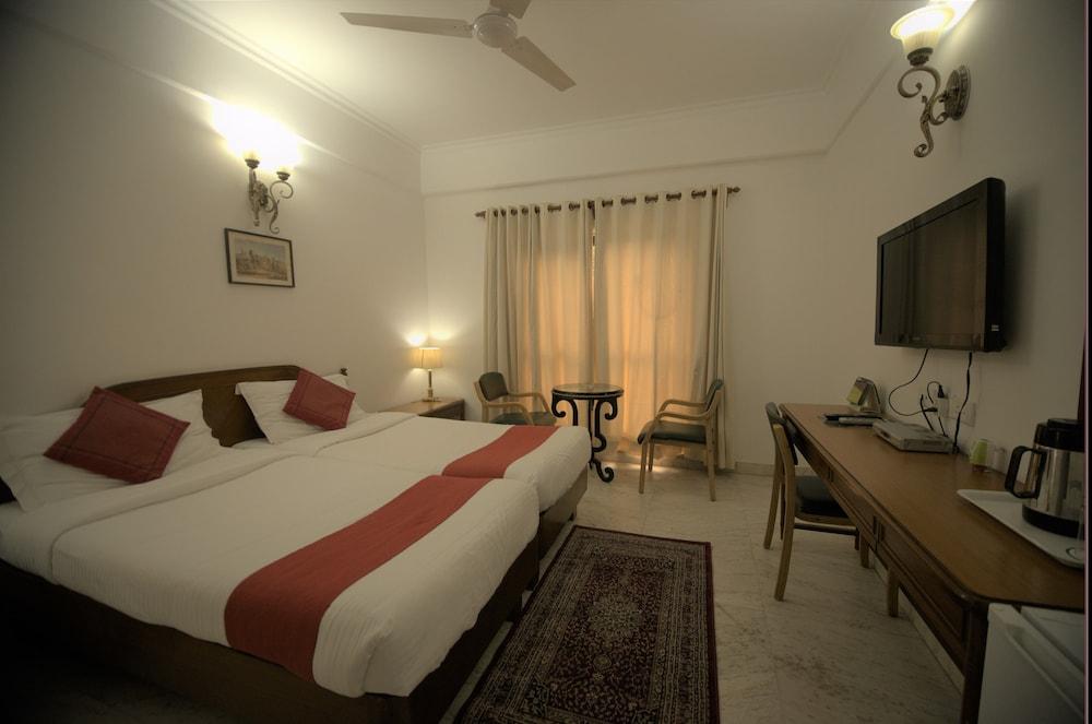 Hotel Palm Greens Nueva Delhi Exterior foto